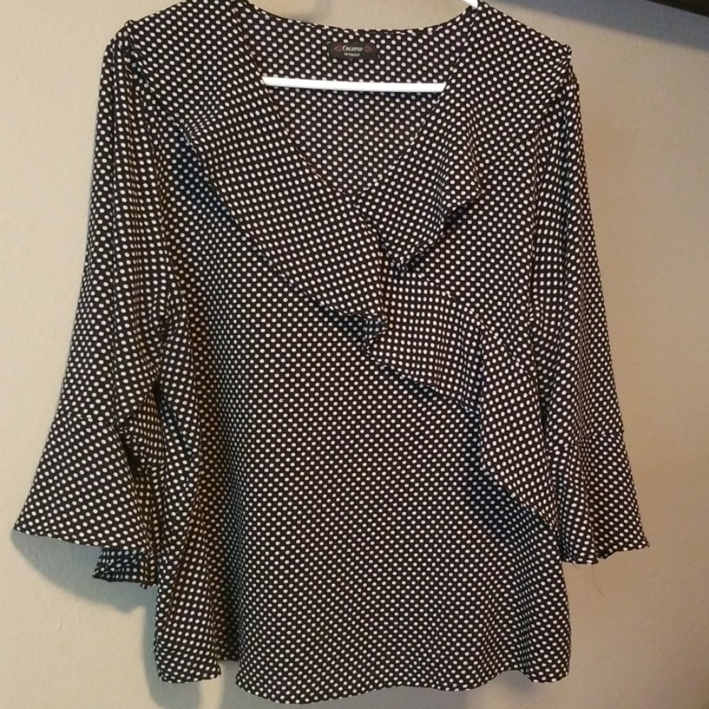 Black and white polka-dot blouse